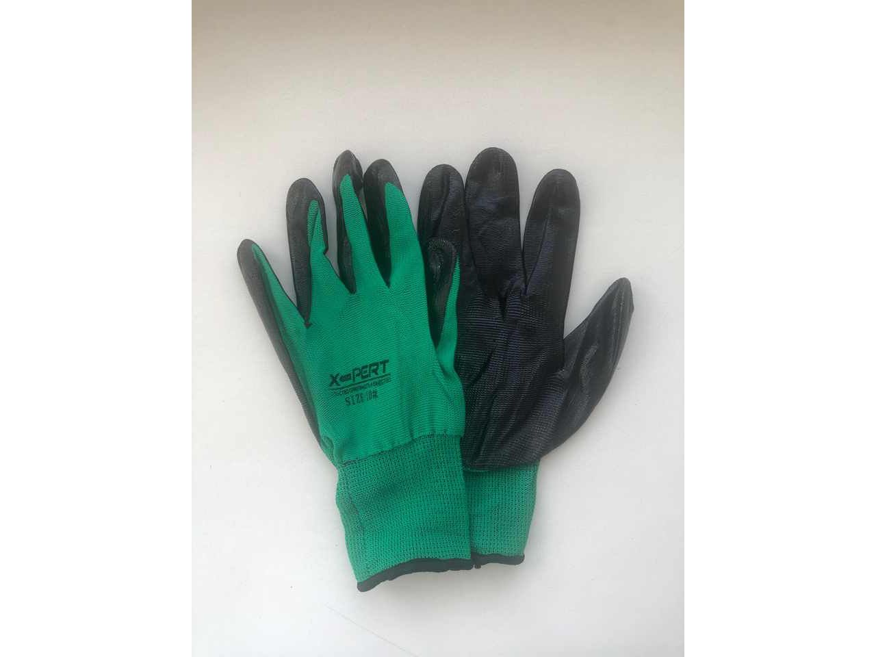 Изображение товара Перчатки нейлоновые Зеленые с черным латексным покрытием (уп-12шт) в Миди Лтд